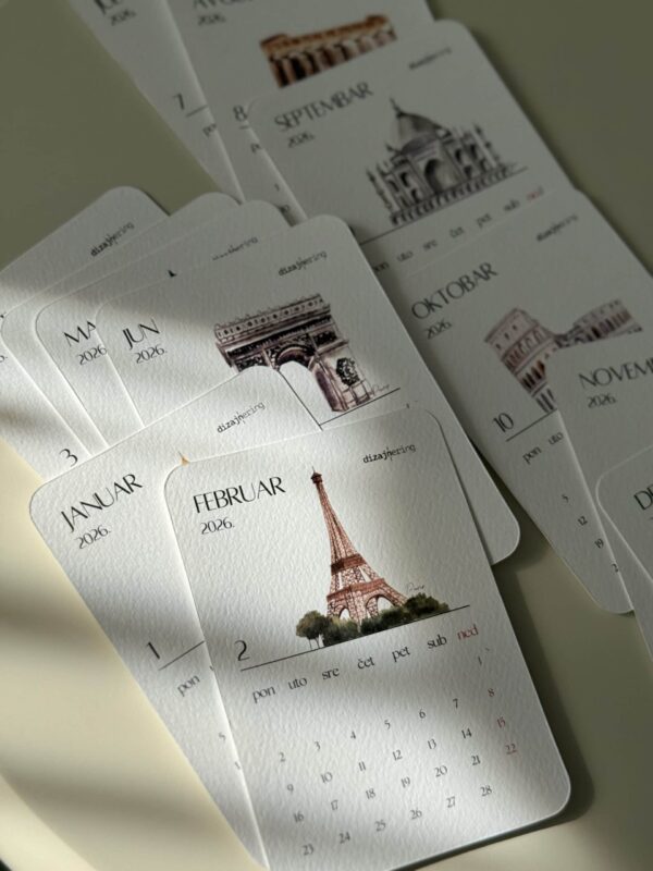 Elegant travel-themed 2026 calendar pages featuring iconic landmarks like the Eiffel Tower and Taj Mahal, designed for stylish organization.