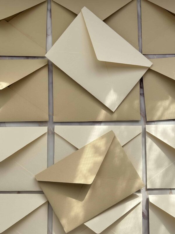 Elegant beige envelopes for professional correspondence and invitations.