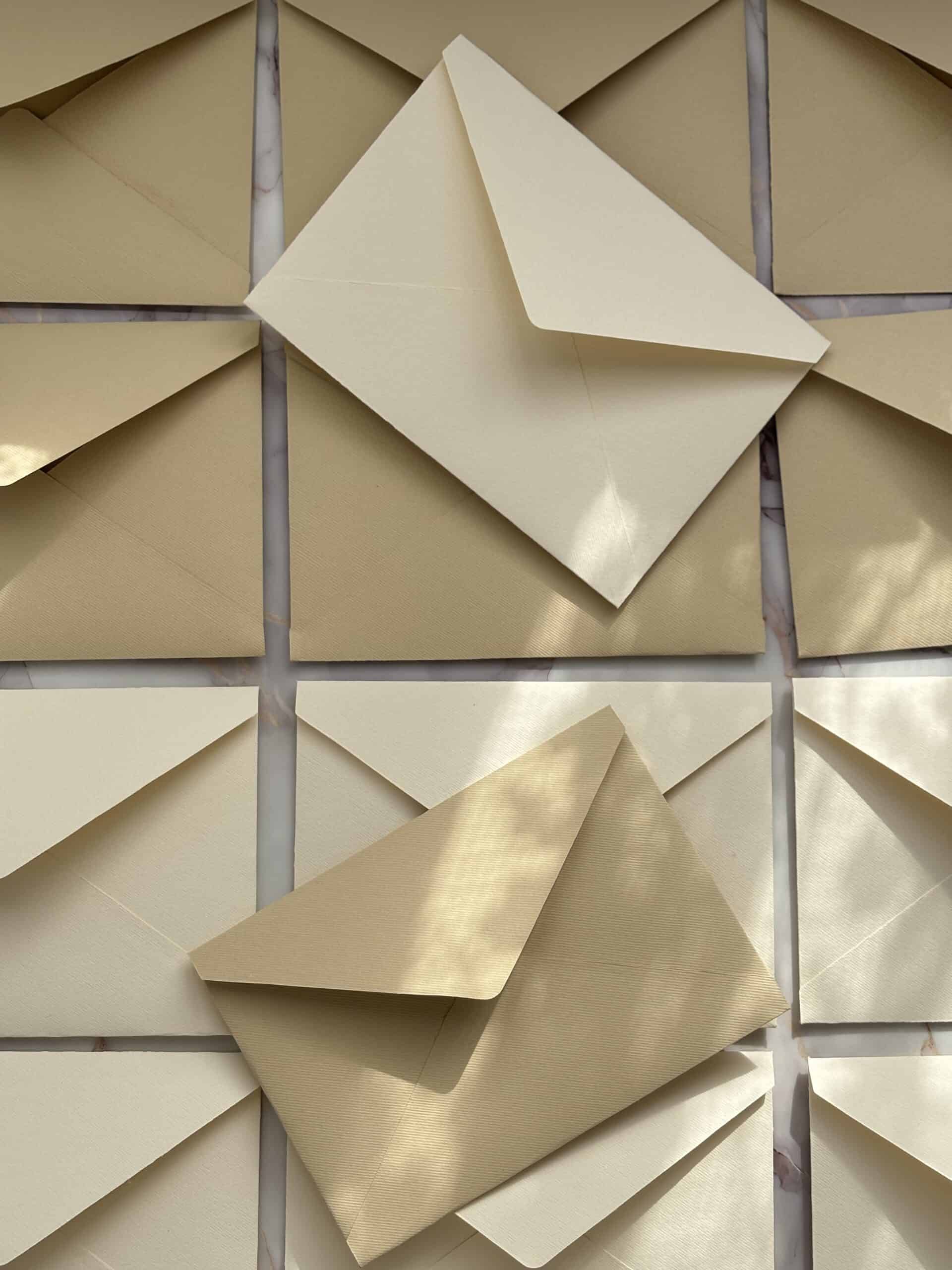 Elegant beige envelopes for professional correspondence and invitations.