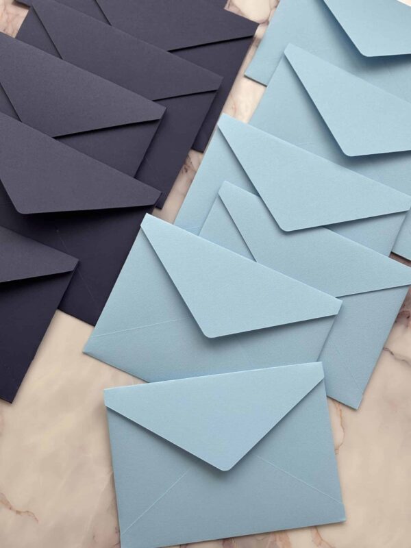 Elegant navy and light blue envelopes for invitations or correspondence.