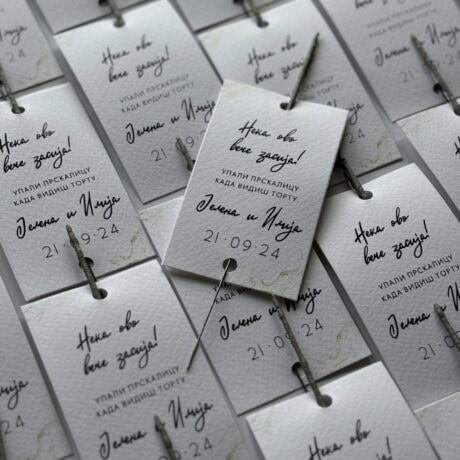 Elegant wedding thank you card with handwritten message and decorative pin, perfect for wedding favo.