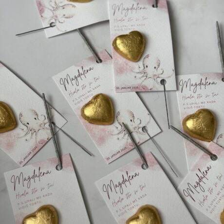 Chocolate heart wedding favors with personalized tags for "Zahvalnica M65" event.