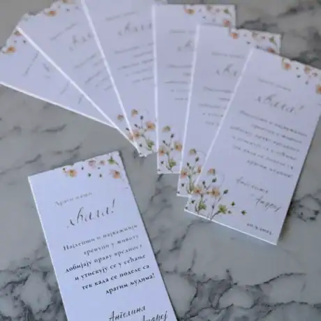 Elegant thank you cards for V10 event, featuring floral design and personalized messages.