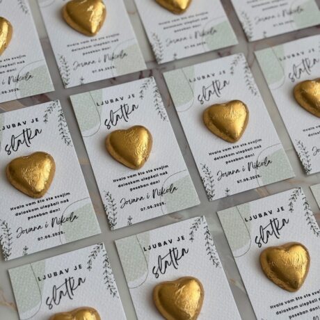 Heart-shaped chocolate favor for wedding guests.