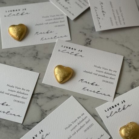 Love is sweet thank you note with gold heart embellishments.
