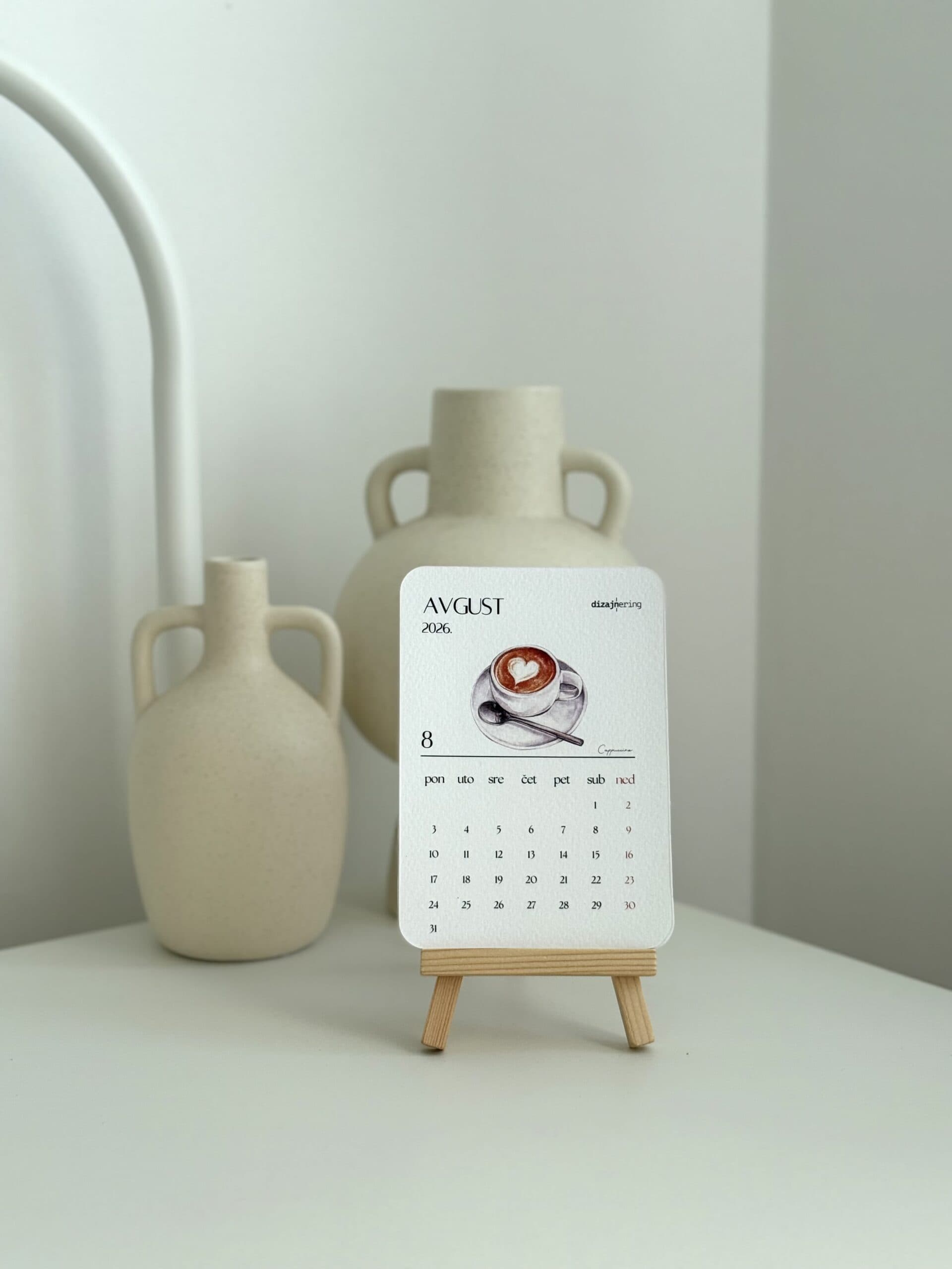 Elegant minimalistic desk calendar with coffee-themed design, perfect for modern home office decor.