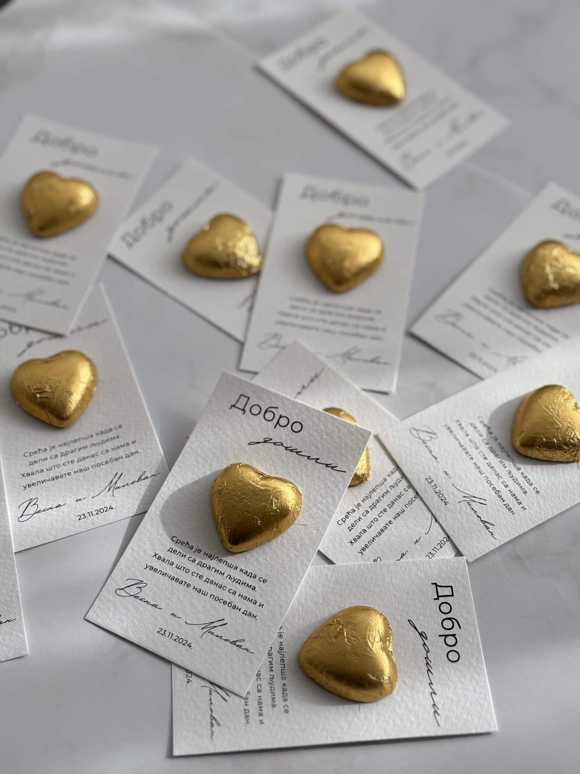 Golden heart-shaped chocolates on thank you cards with "Добро" written on them, celebrating gratitud.
