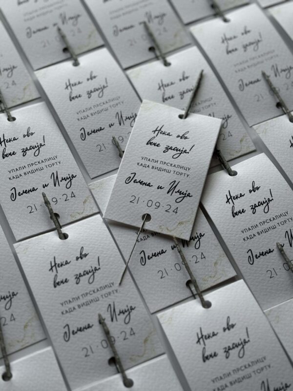 Elegant wedding thank you card with handwritten message and decorative pin, perfect for wedding favo.