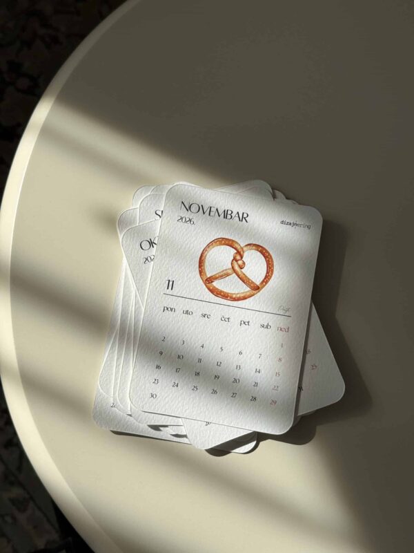Elegant calendar cards with heart-shaped pretzel illustrations for November 2026.