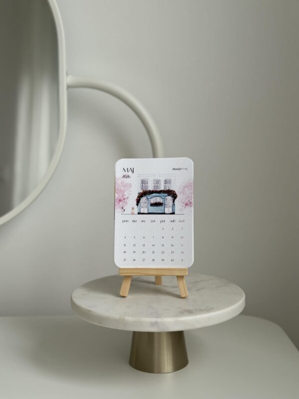 Colorful May 2026 desk calendar on mini easel, modern home decor, minimalist style, elegant design.