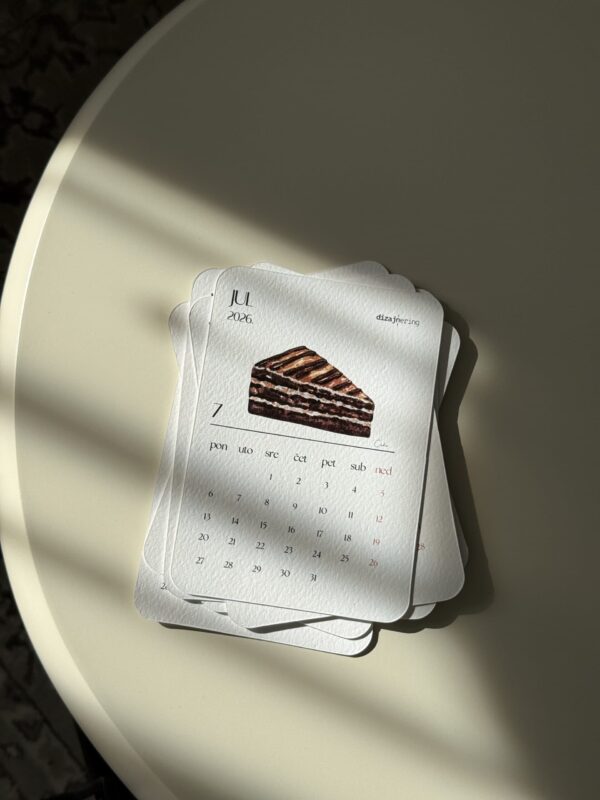 Elegant calendar cards with illustration of layered cake for stylish home decor and organizational purposes.