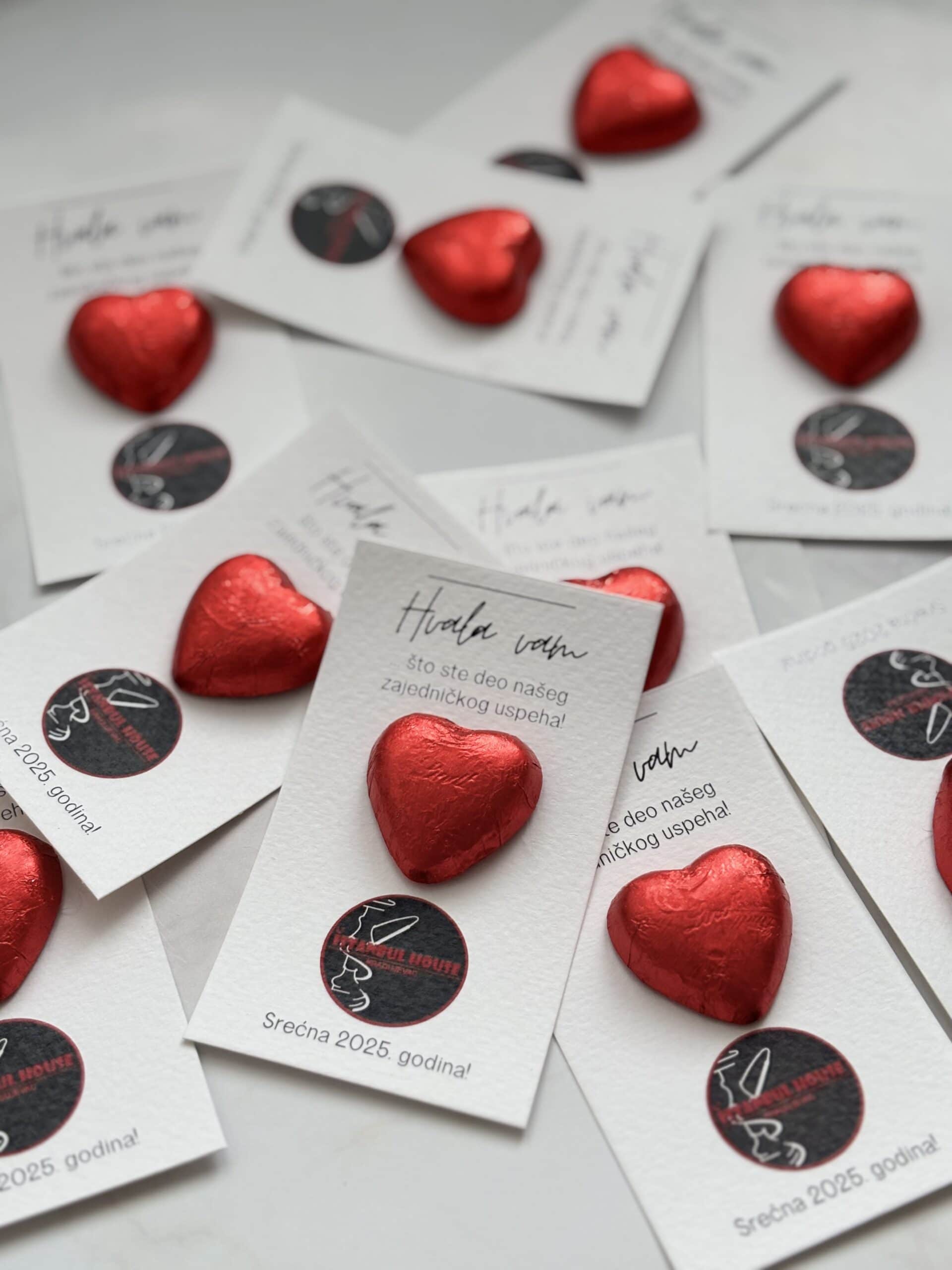 Elegant corporate thank you cards with red heart decorations for professional appreciation.