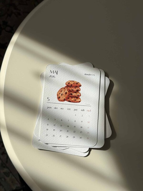Delicious cookies illustrated on a May 2026 calendar, with a minimalist design.