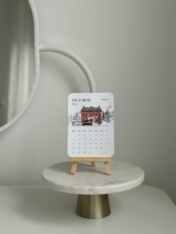 Elegant December wall calendar on minimalist wooden display stand. Perfect for modern interior decor.