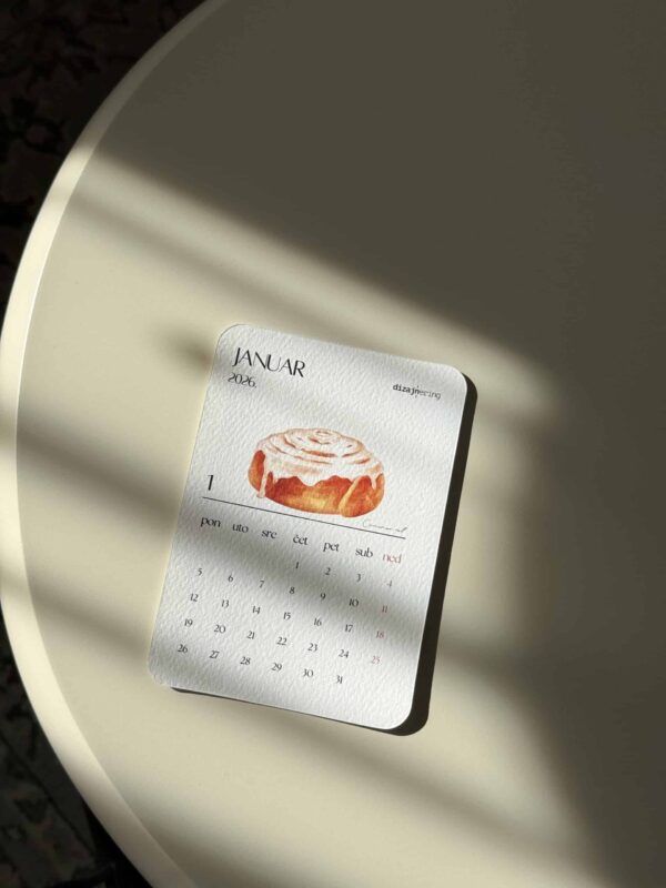 Elegant monthly calendar for January 2026, featuring minimalist design and watercolor illustration.