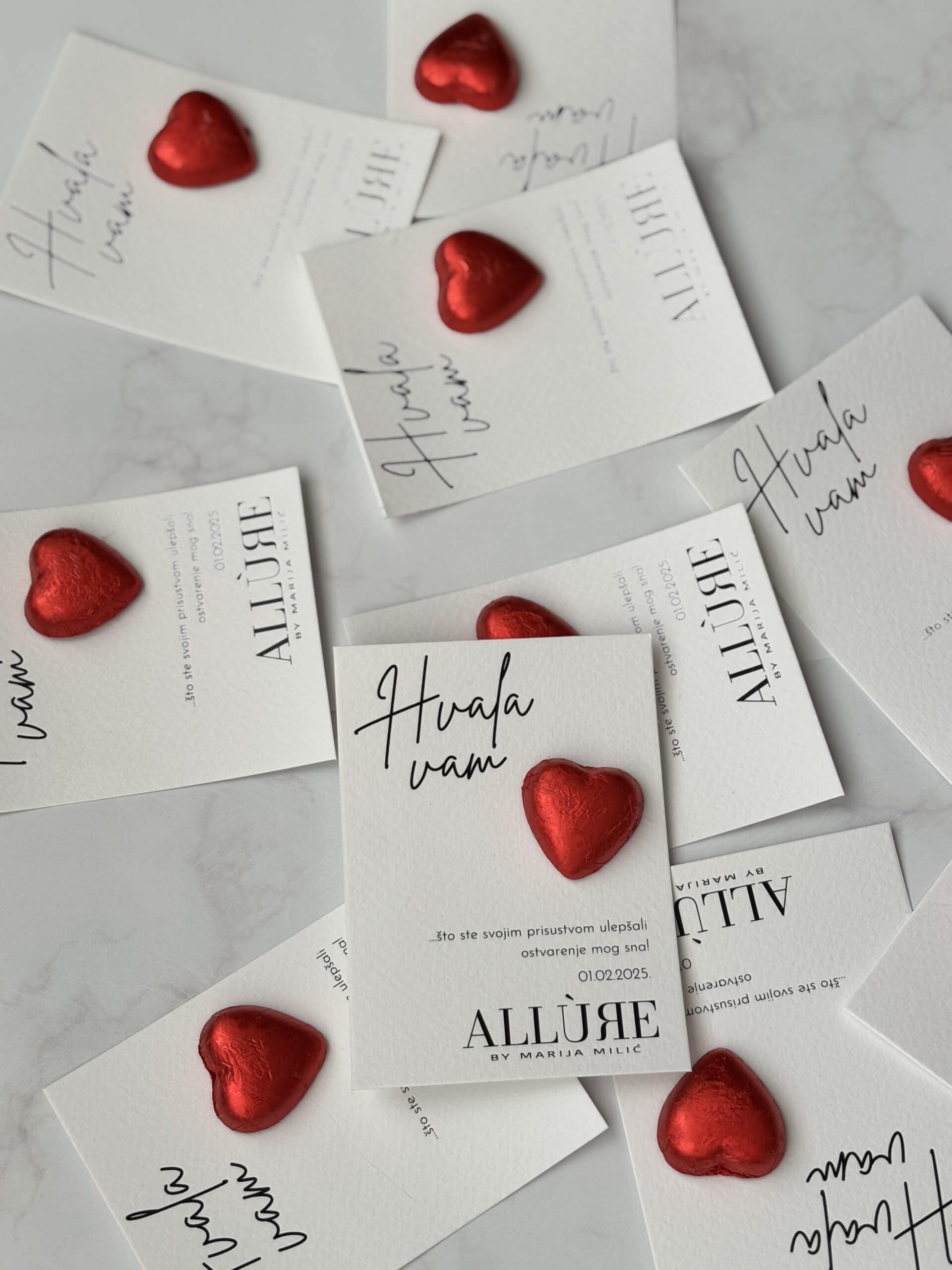 Elegant thank you cards with red heart decorations for corporate appreciation.