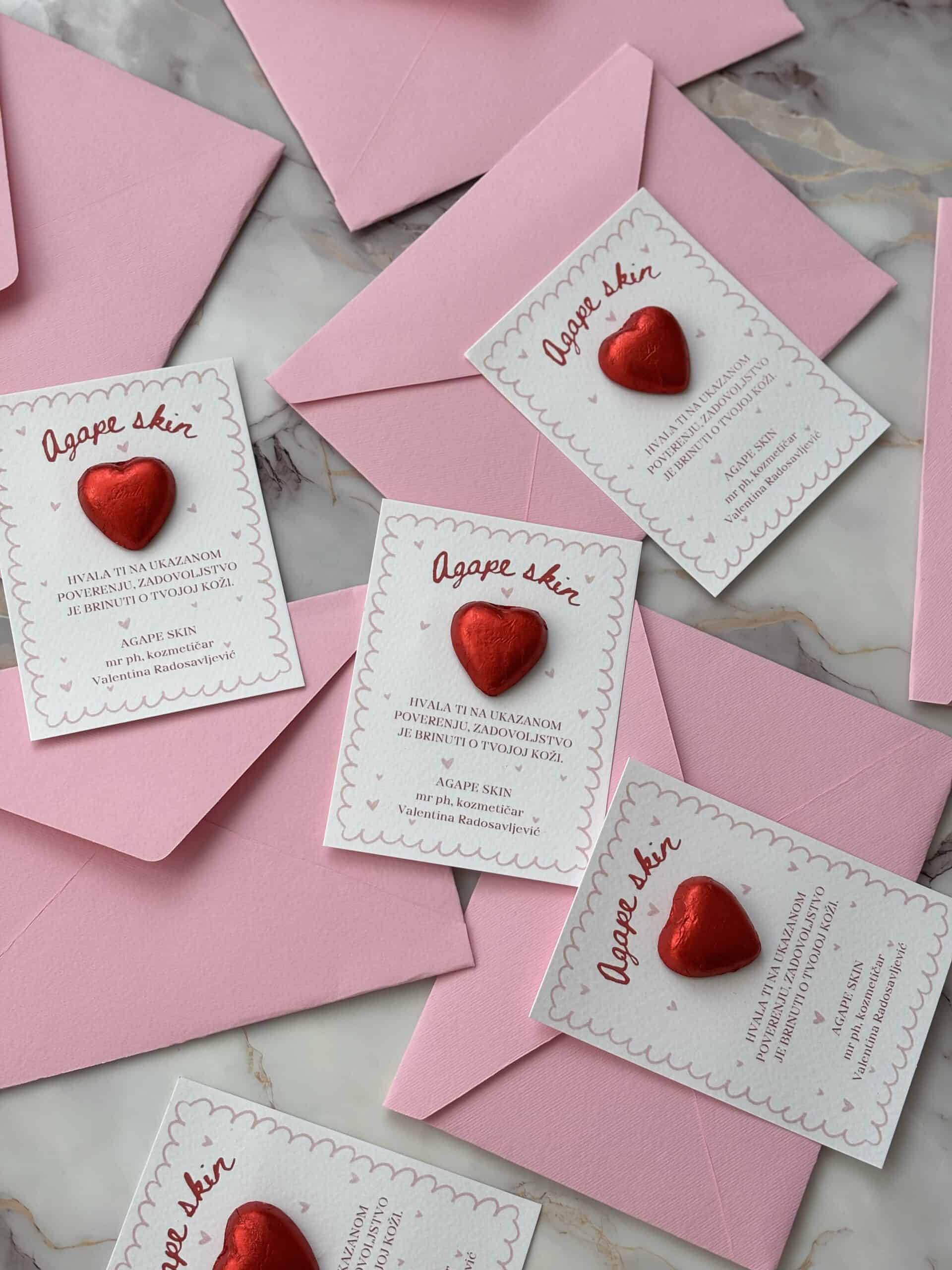 Personalized thank you cards with red heart embellishments for corporate gratitude.