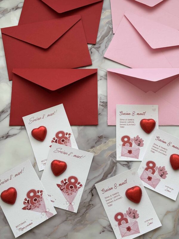 Red and pink envelopes with Valentine's Day cards and heart-shaped decorations for International Wom.