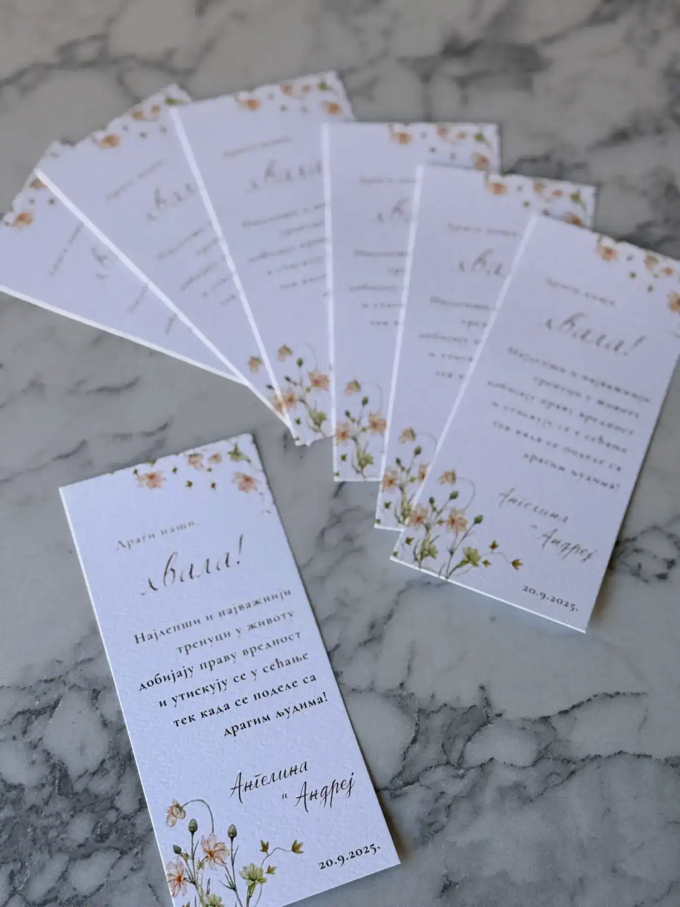 Elegant thank you cards for V10 event, featuring floral design and personalized messages.