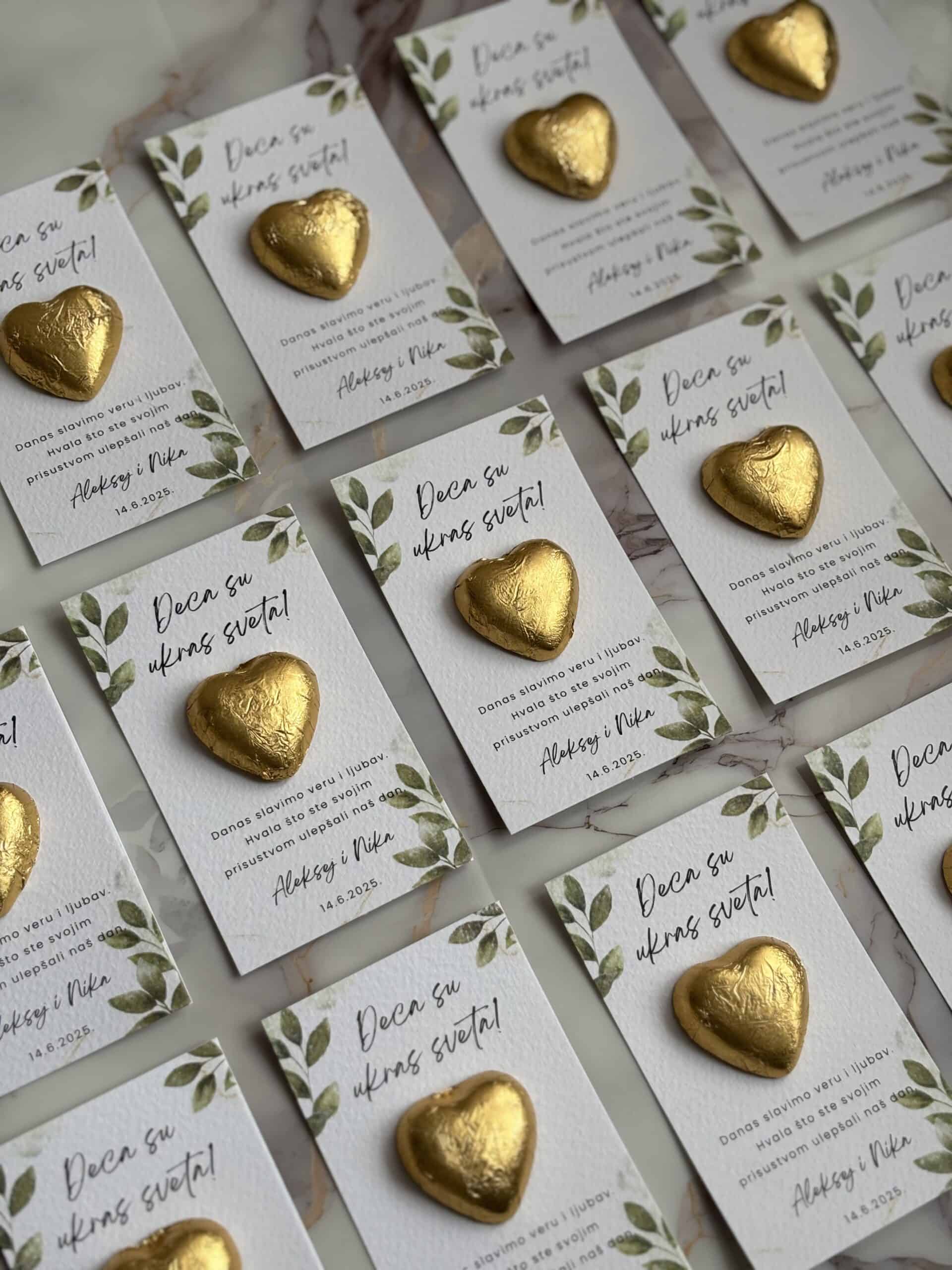 Heart-shaped chocolates on thank you tags for Zahvalnica M58.