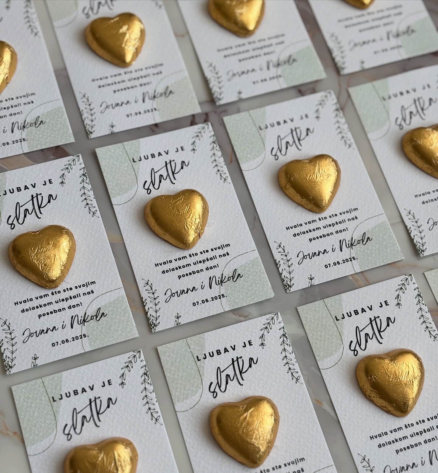 Heart-shaped chocolate favor for wedding guests.