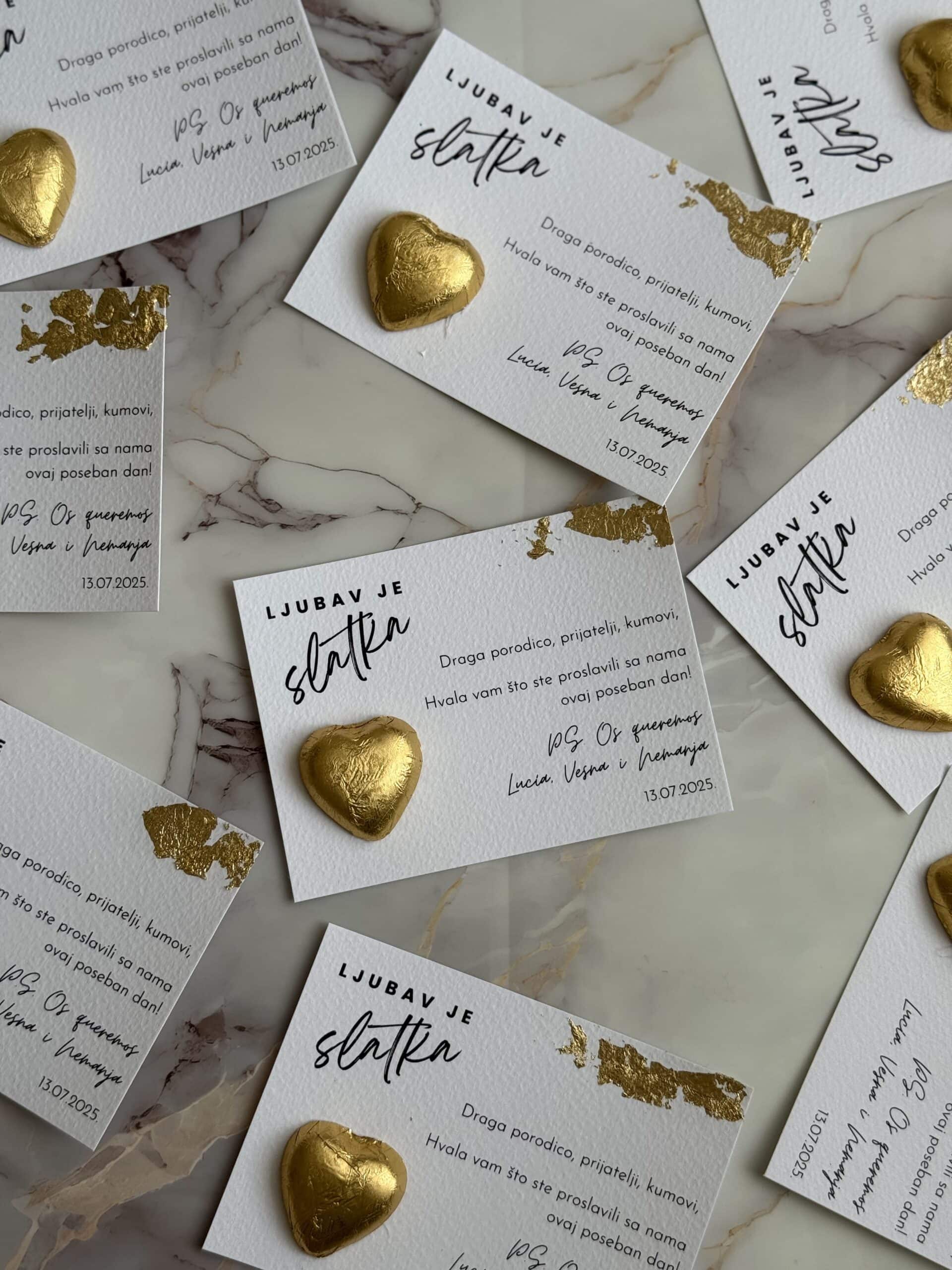 Heart-shaped golden chocolates on thank you cards.