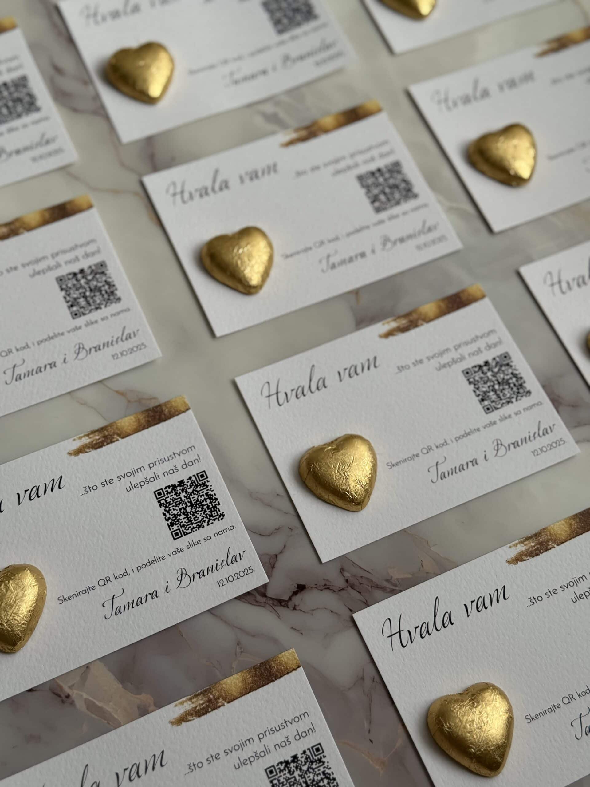 Thank you gift tags with gold heart accents for wedding favors.