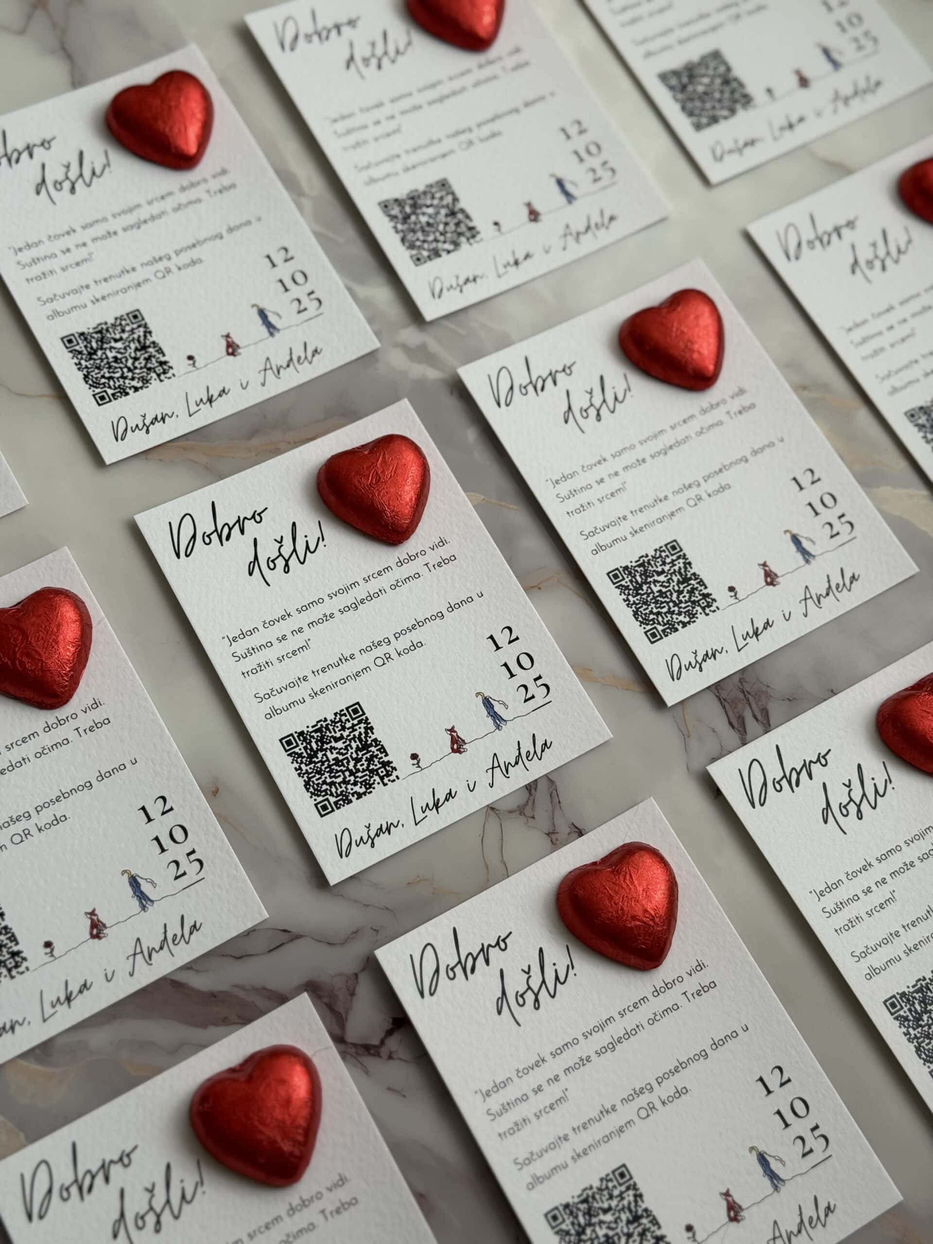 Wedding place cards with red heart decorations for "Zahvalnica-Mali princ" event.