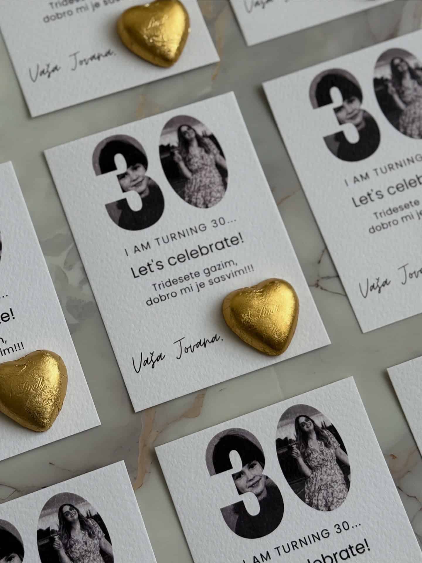 Celebration card for 30th birthday with black and white photos and gold heart embellishments.